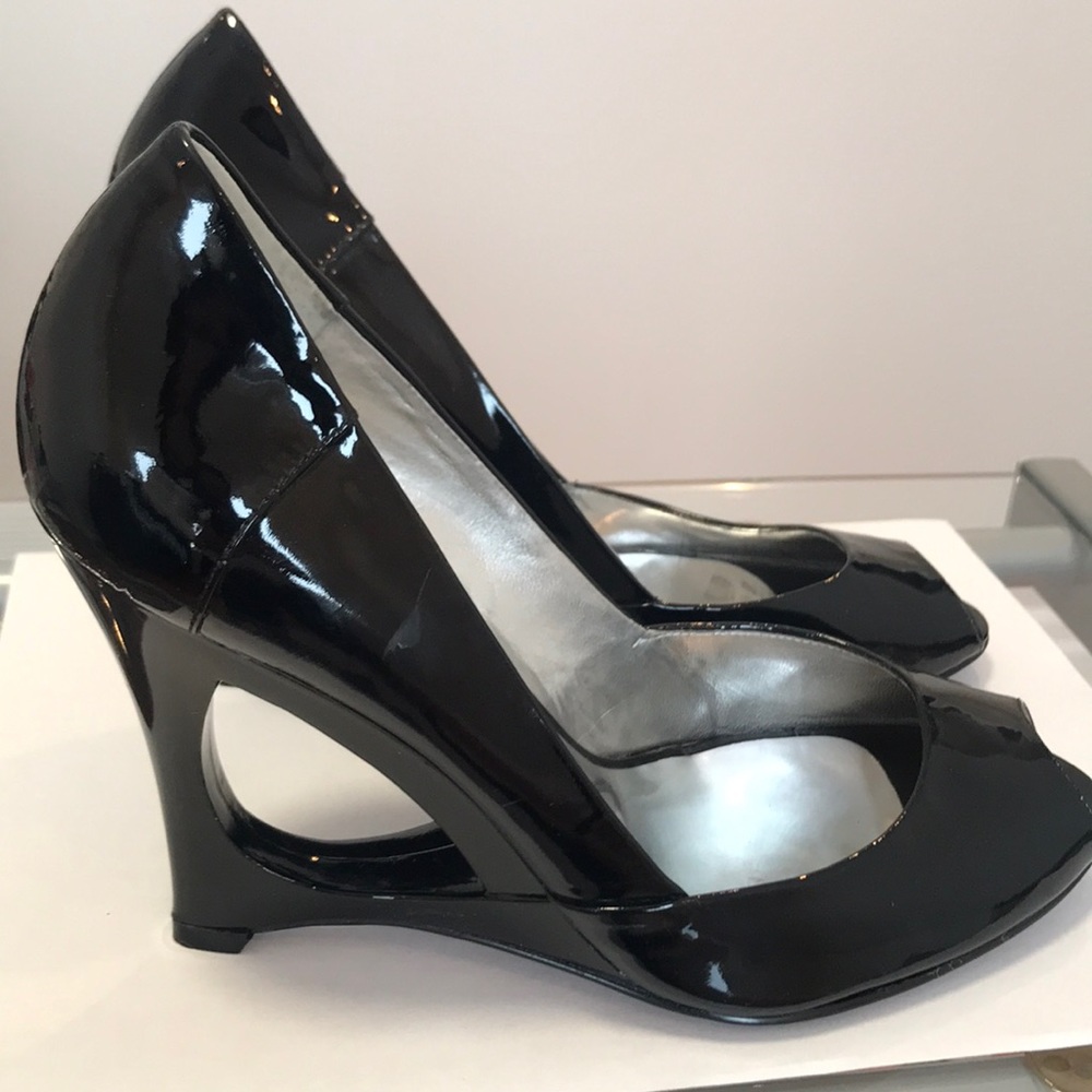 Guess by Marciano. Peep toe, cut out heel pumps. Never worn.